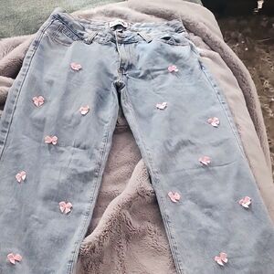 Women's Blue Jeans with Pink Bow Accents